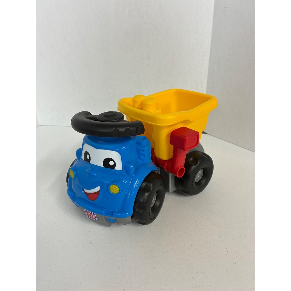 Mega Bloks Blue Dump Truck Toy with Yellow Tilting Bin and Smiling Face